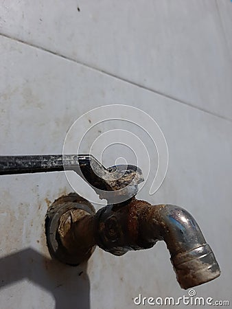 Close up photo of rusty water faucet Stock Photo