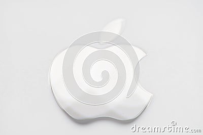 Close-up photo of silver Apple logo Editorial Stock Photo