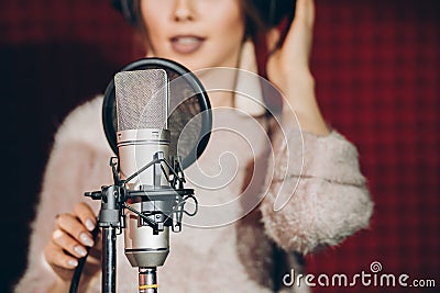 Close up photo. talented female near the microphone Stock Photo