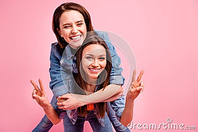 Close up photo two beautiful funky sisters she her best ladies party chill mood hugging v-sign symbol say hi hello Stock Photo