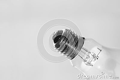 close up photo of a used light bulb isolated on a white background. Stock Photo