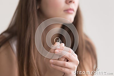 Close up photo of wedding ring in womans hands Stock Photo