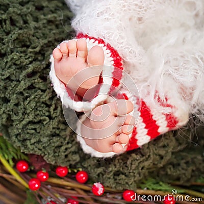 Close up picture of new born baby feet, christmas time Stock Photo