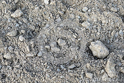 Close-up of a pile of crushed stone in the sand Stock Photo