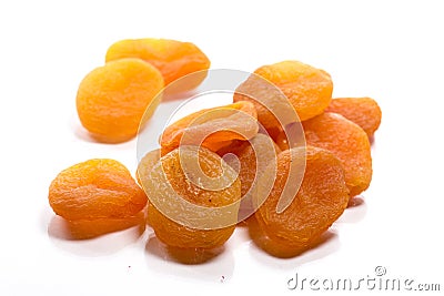 Close-up of pile dried, raw apricots on white background Stock Photo