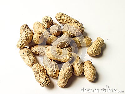 Pile peanuts on white background Stock Photo