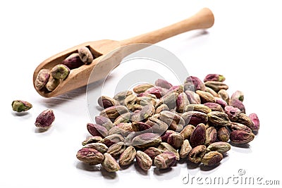 Close-up of pile of roasted, salted nuts pistachio in a wooden s Stock Photo