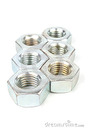 Pile of steel Hexagon Nuts. Stock Photo