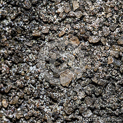 close up of a pile of stones in the ground as a background Stock Photo