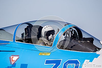 Close up of a pilot in the cockpit of a Sukhoi Su-27 Flanker fighter jet aircraft at Kleine-Brogel Airbase. Belgium - September 14 Editorial Stock Photo