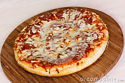 Close up of pizza with tomatoes, cheese, black oli Stock Photo