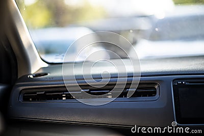 Close up of plastic car air ventilation grills from air condition system in a compact car. Stock Photo