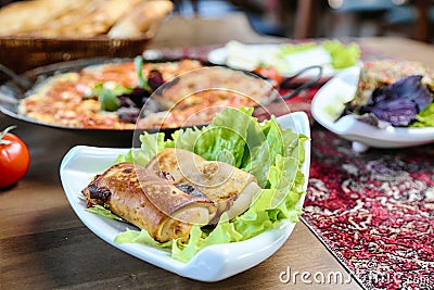 Close-up of a Plate of Delicious Food on a Table Stock Photo