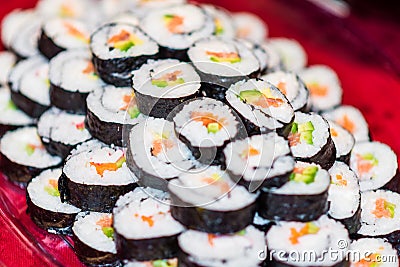 Close up of a plate full with sushi rolls. Stock Photo