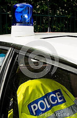 Police sign on police patrol car. Stock Photo
