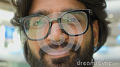 Close up portrait Arabian bearded smiling cheerful positive carefree man in glasses Indian CEO pensive Muslim worker Stock Photo