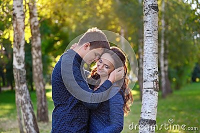 Close up portrait of attractive young couple in love outdoors Stock Photo