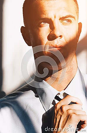 Close up portrait of awesome stylish men in elegant suite posing in abandoned place. Elegance and Luxury Business Man concept Stock Photo