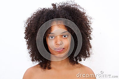 Close up portrait beautiful black woman with bare shoulders staring Stock Photo