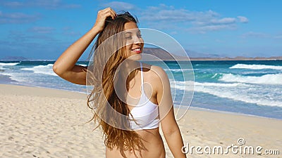Close up portrait of beautiful girl have fun on Corralejo Dunas beach in Fuerteventura, Canary Islands Stock Photo