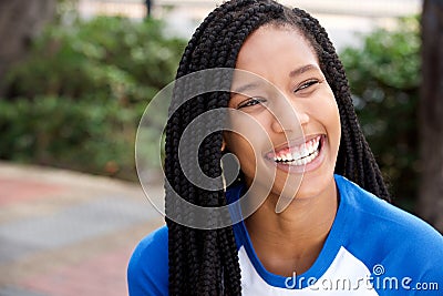 Close up beautiful smiling african american girl with braids Stock Photo