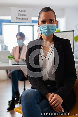 Close up portrait of business employee in working space Stock Photo