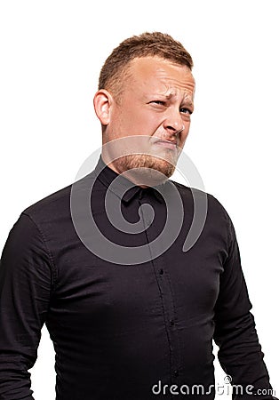Close up portrait of a confident, blond, handsome young man wearing black shirt, isolated on white background Stock Photo
