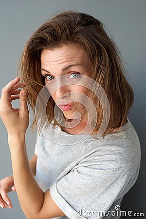 Close up portrait of a cool mid adult woman Stock Photo