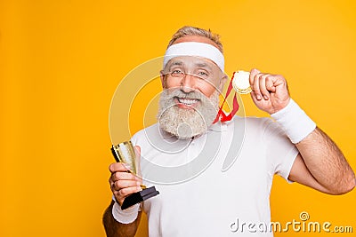 Close up portrait of crazy comic emotional cool grandpa holding Stock Photo