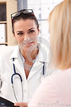 Close up portrait of female doctor with patient Stock Photo