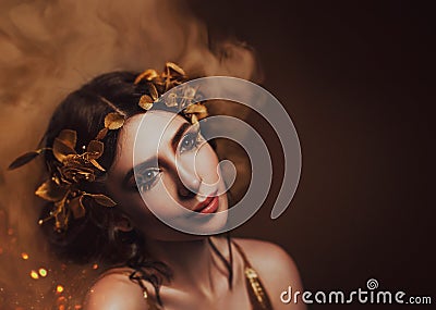 Close-up portrait. Girl with creative make-up and with golden eyelashes. The Greek goddess in a laurel wreath with Stock Photo