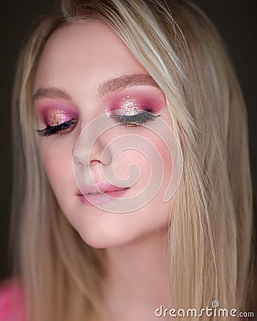 Close-up portrait of a girl with pink makeup Stock Photo