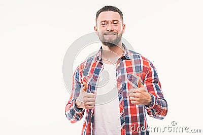 Close up portrait of a happy casual man showing thumbs up gesture over white background Stock Photo