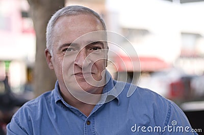 Close-up portrait of a happy mature man Stock Photo