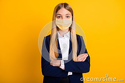 Close-up portrait of her she nice attractive long-haired schoolkid wearing safety mask folded arms mers cov wuhan Stock Photo