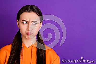 Close-up portrait of her she nice attractive moody offended bored girl with pigtails blowing cheeks looking aside Stock Photo