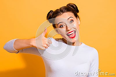 Close-up portrait of her she nice cool attractive winsome lovely cheerful funny optimistic girl showing thumbup isolated Stock Photo