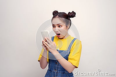 Close-up portrait of her she nice cute charming attractive lovely lovable magnificent nervous girl wearing denim jumpsuit holding Stock Photo