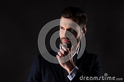 Close-up portrait of his he nice attractive content chic classy minded man director agent broker financier touching chin Stock Photo