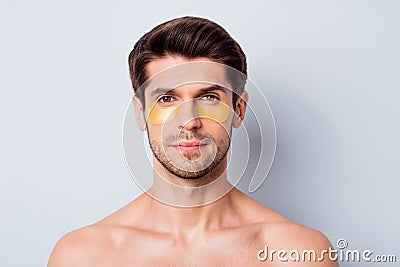 Close-up portrait of his he nice attractive well-groomed bearded brown-haired guy wearing eye facial patches modern Stock Photo