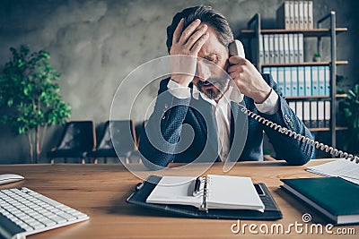 Close-up portrait of his he sullen depressed miserable jobless middle-aged guy employee talking on phone crisis staff Stock Photo