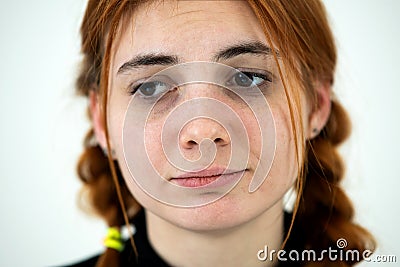 Close up portrait of innocent looking redhead pretty teenage girl Stock Photo