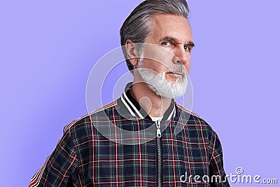 Close-up portrait of mature gray-bearded male Stock Photo