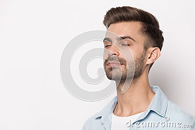 Close up portrait with peaceful handsome bearded man. Stock Photo