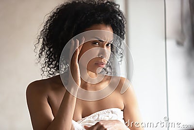 Close up portrait 30s woman found facial wrinkles feels worried Stock Photo