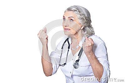 Close up portrait of senior female doctor with fists Stock Photo