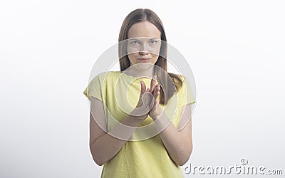 Close up portrait of sly, scheming young woman plotting something isolated on white background Stock Photo
