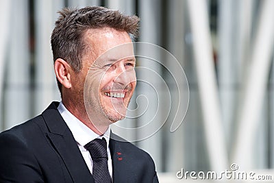 Close up portrait of smiling older businessman in suit and tie Stock Photo