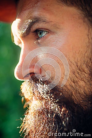 Close up portrait of stylish handsome young man in rural village. Stock Photo