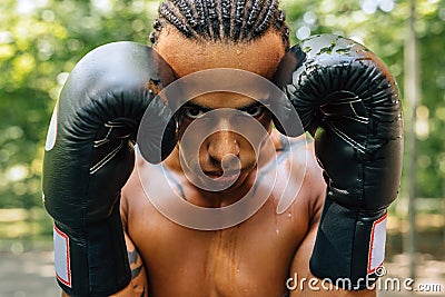 Close up portrait of a sweated kickboxer Stock Photo
